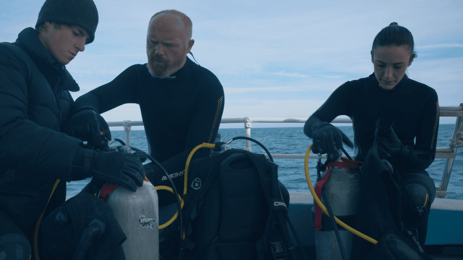 A shot from a commercial filmed for APS bank, showing divers on a boat getting ready to dive.
