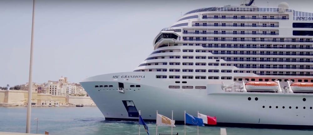 The MSC Grandiosa cruise liner at the Valletta Waterfront in motion blur's commercial